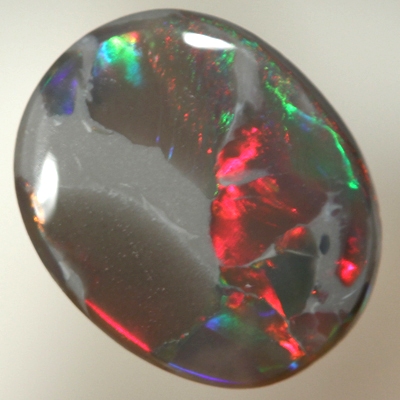 SOLID BLACK OPAL Unusual play of colour, bright fire
